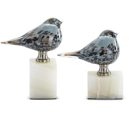 Blue Glass Birds on White Square Marble Block